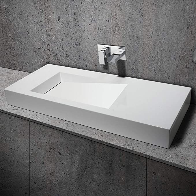Asymetryczna umywalka na indywidualny wymiar z materiałów Solid Surface z misą Slide 66x30SOL