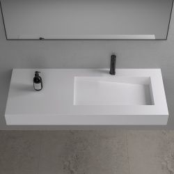 Asymetryczna umywalka na indywidualny wymiar z materiałów Solid Surface z misą Slide 66x30SOL