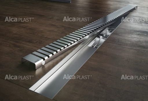 Odpływ liniowy niski 120 cm do zabudowy przy ścianie 5,5 cm wysokości Alcaplast APZ104 z rusztem LINE APZ104-1150-LINE-1150